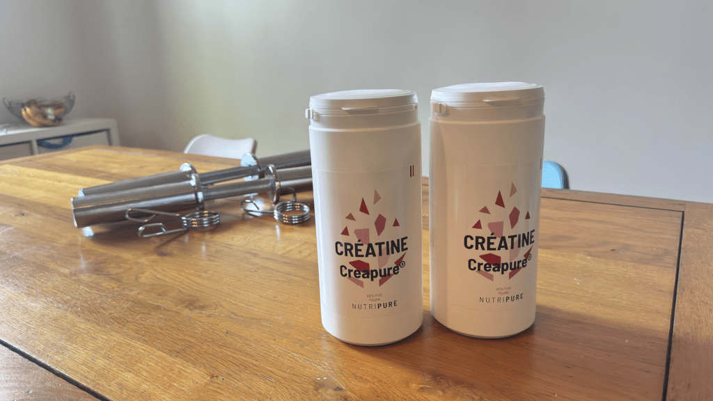 2kg de cr&eacute;atine Nutripure avec mes halt&egrave;res olympique en fond